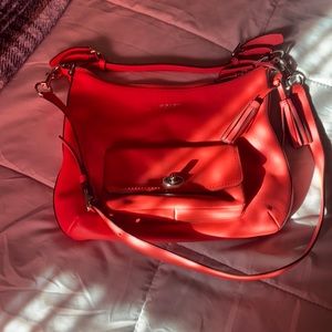 Coach Leather Handbag This is a beautiful Coral, been used twice.